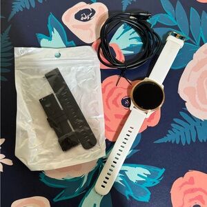 Garmin Venu 2S with White Strap and black.Battery is not the greatest but doable